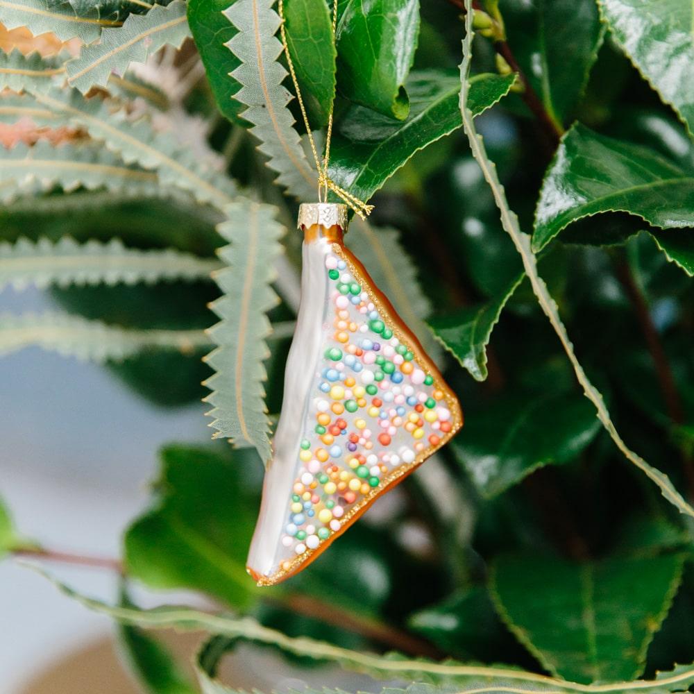 Make Me Iconic Christmas glass ornament set, 5-piece Australian-themed decorations featuring Fairy Bread, Lamington, Ute with tree, Surfboard, and Cockatoo, crafted in glass with paint and glitter details, great for gifts and Aussie souvenirs.