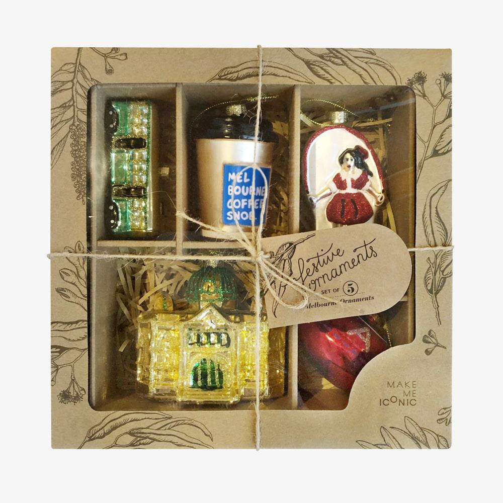 Melbourne Christmas glass ornaments in a gift box featuring Australian holiday decorations such as the Skipping Girl, W-Class Tram, Flinders Street Station, and Coffee Snob designs.
