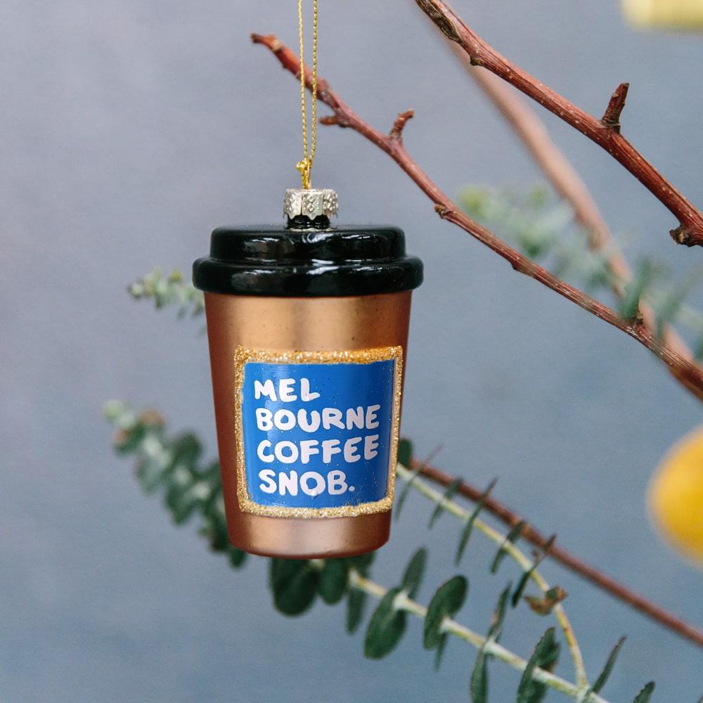 Melbourne Christmas glass ornaments in a gift box featuring Australian holiday decorations such as the Skipping Girl, W-Class Tram, Flinders Street Station, and Coffee Snob designs.