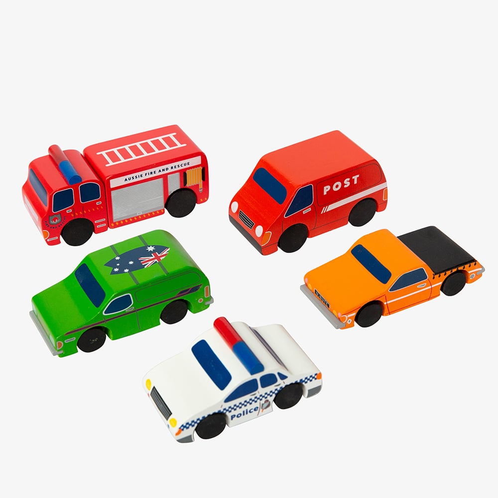 Aussie wooden toy vehicle set featuring Sandman Panel Van, retro-orange ute, fire truck, and postie bike for imaginative play
