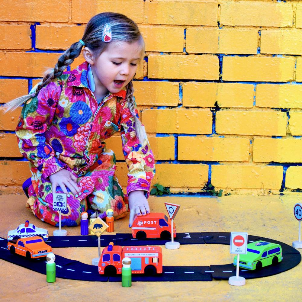 Make Me Iconic Australian wooden toy vehicle set featuring Sandman Panel Van, retro-orange Ute, Australian fire truck, Australian Police Car and Australia Post Truck for imaginative play