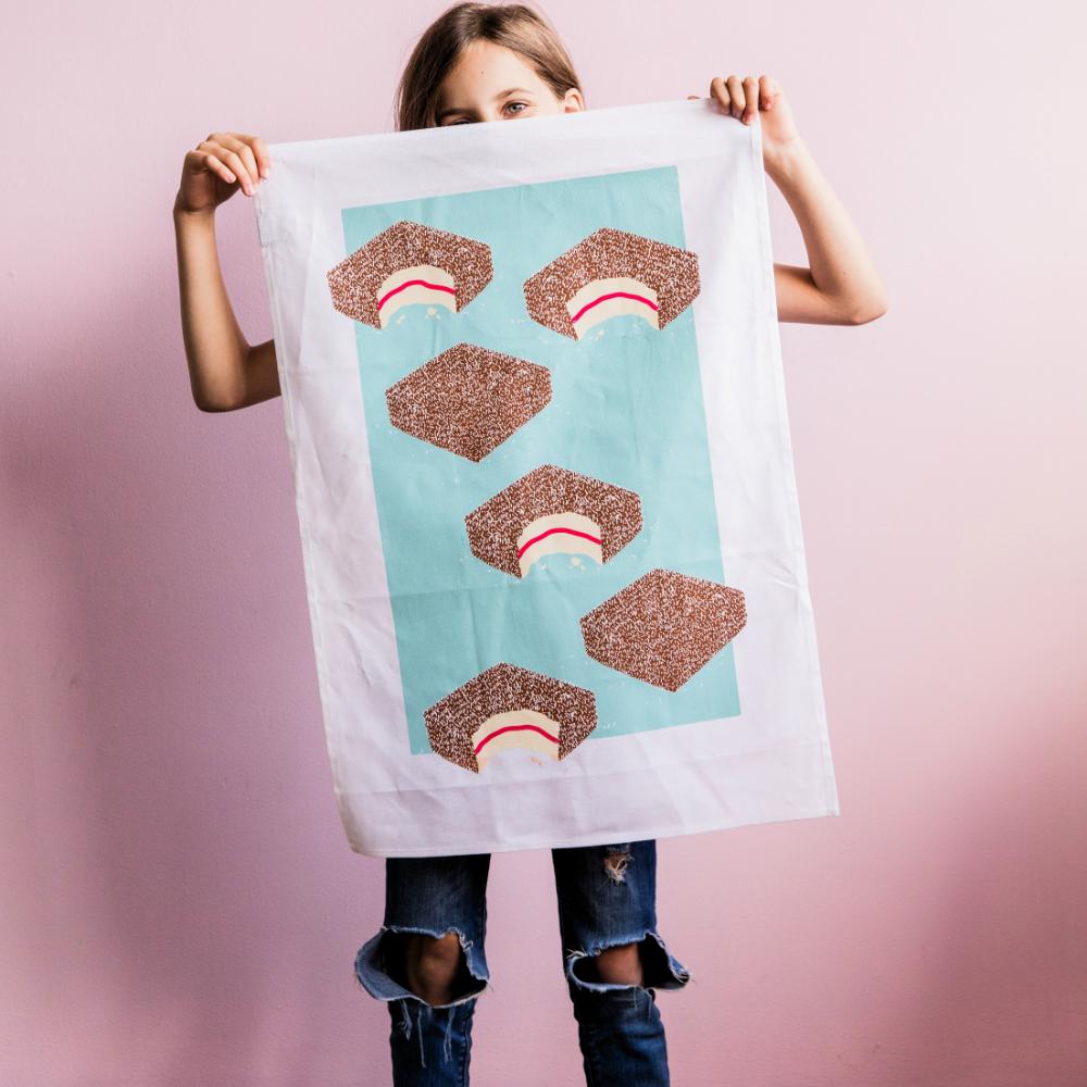Australian Lamington Tea Towel featuring a bold retro design, 100% cotton kitchen towel celebrating classic Aussie desserts and nostalgic treats.