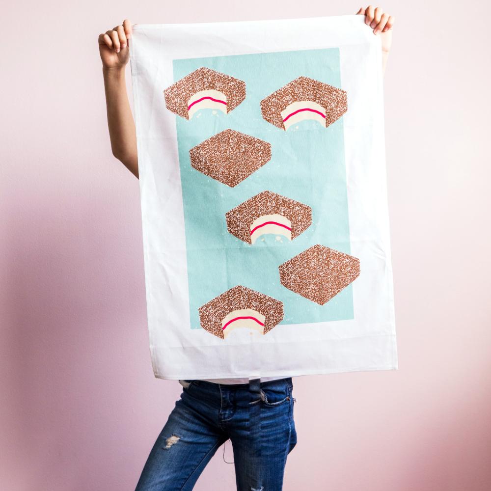 Australian Lamington Tea Towel featuring a bold retro design, 100% cotton kitchen towel celebrating classic Aussie desserts and nostalgic treats.