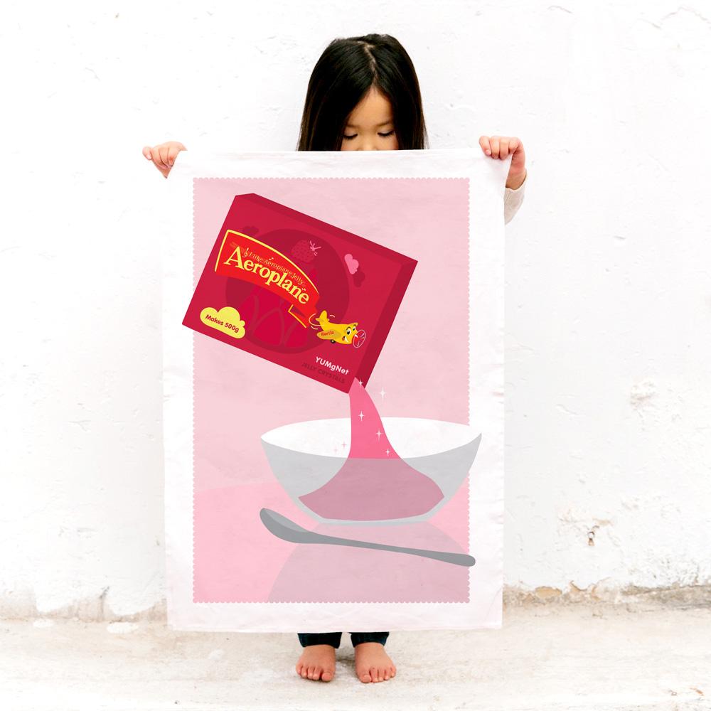 100% cotton Aeroplane Jelly tea towel featuring nostalgic Australian design, perfect for kitchen use, unique gifts, and iconic Aussie souvenirs.