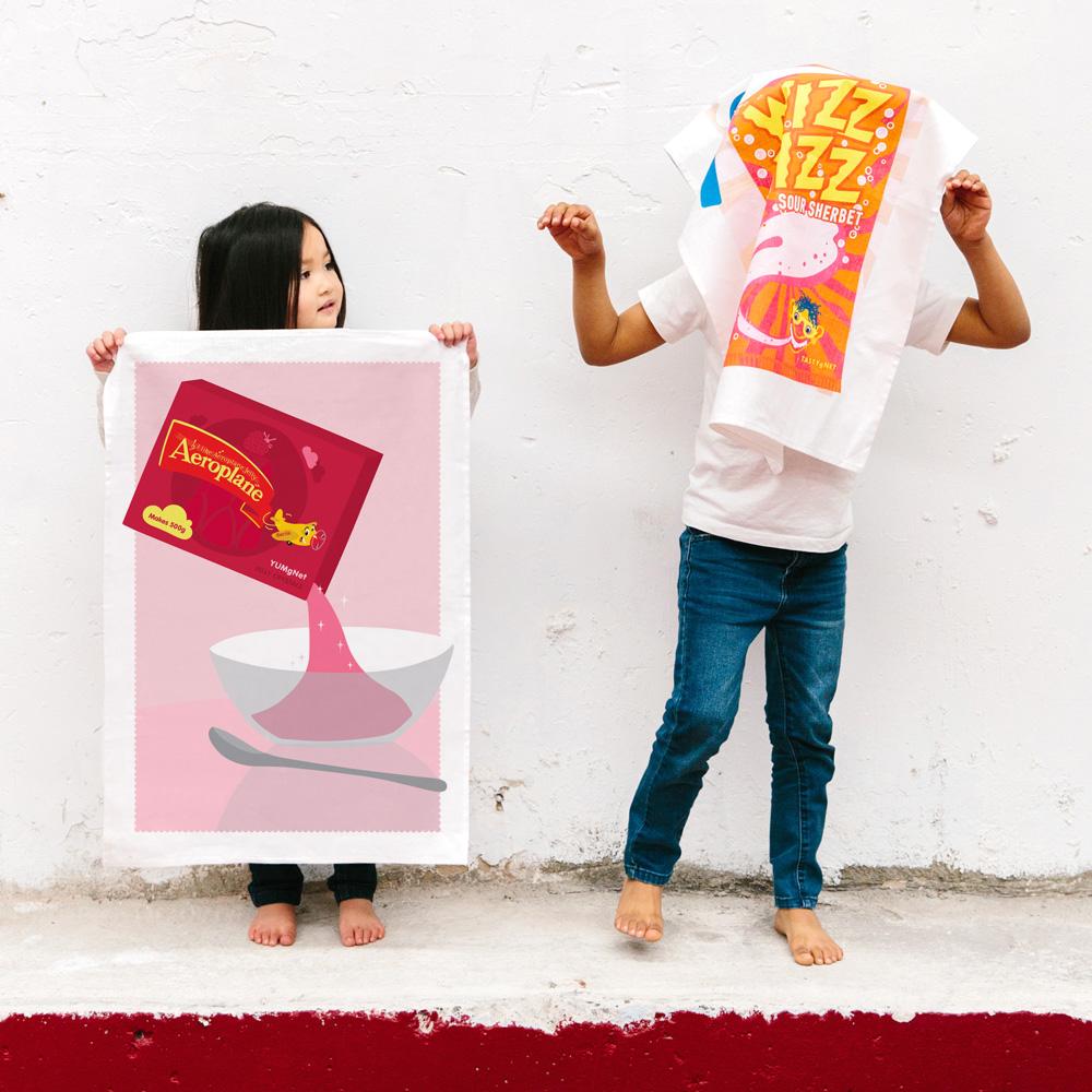 100% cotton Aeroplane Jelly tea towel featuring nostalgic Australian design, perfect for kitchen use, unique gifts, and iconic Aussie souvenirs.