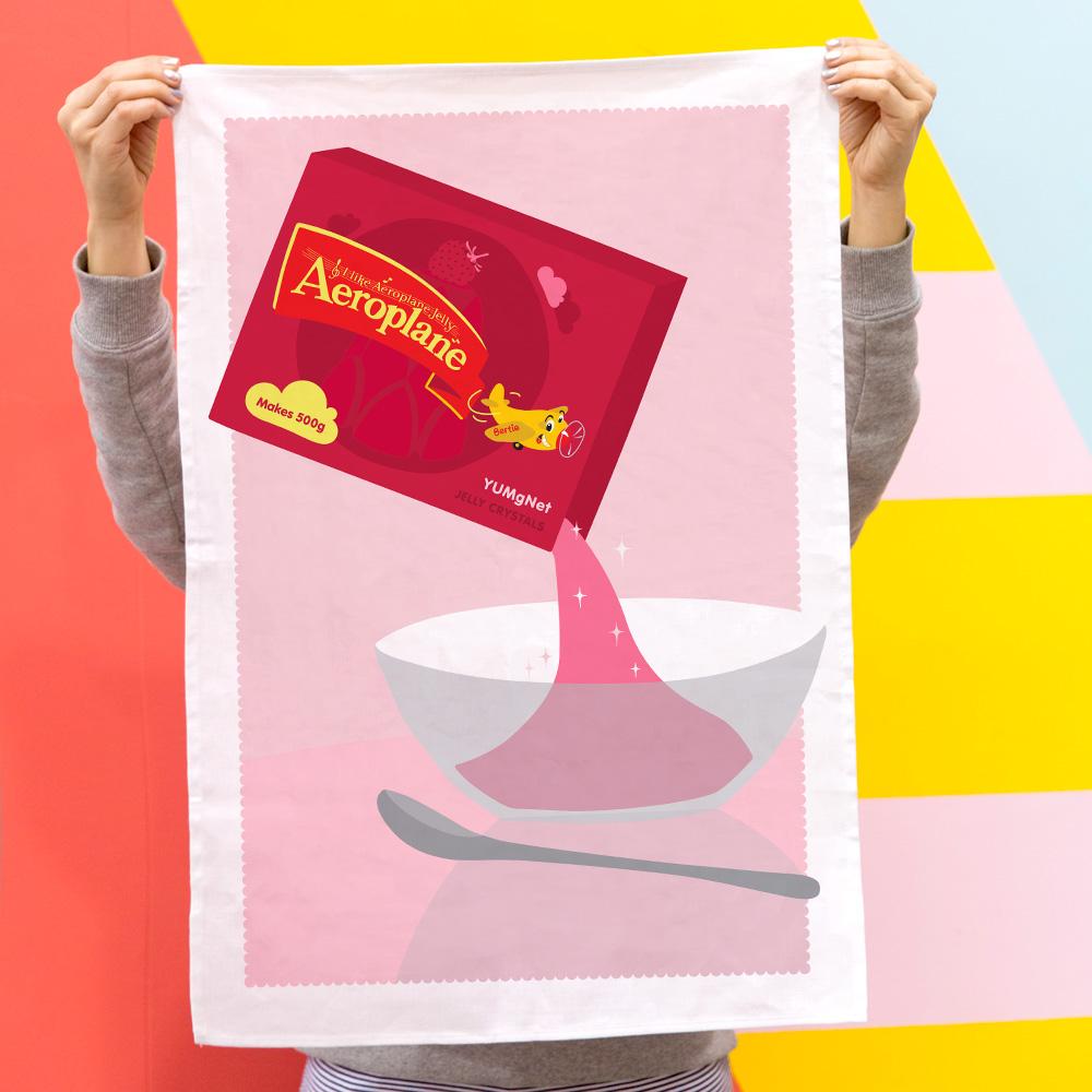 100% cotton Aeroplane Jelly tea towel featuring nostalgic Australian design, perfect for kitchen use, unique gifts, and iconic Aussie souvenirs.