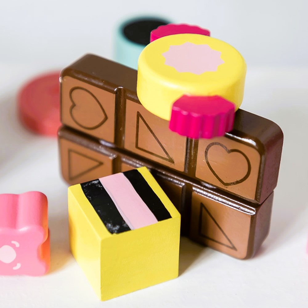 Wooden candy jar toy set for kids featuring hand-painted lollies, candy canes and wrapped sweets in an acrylic jar designed for imaginative pretend play.