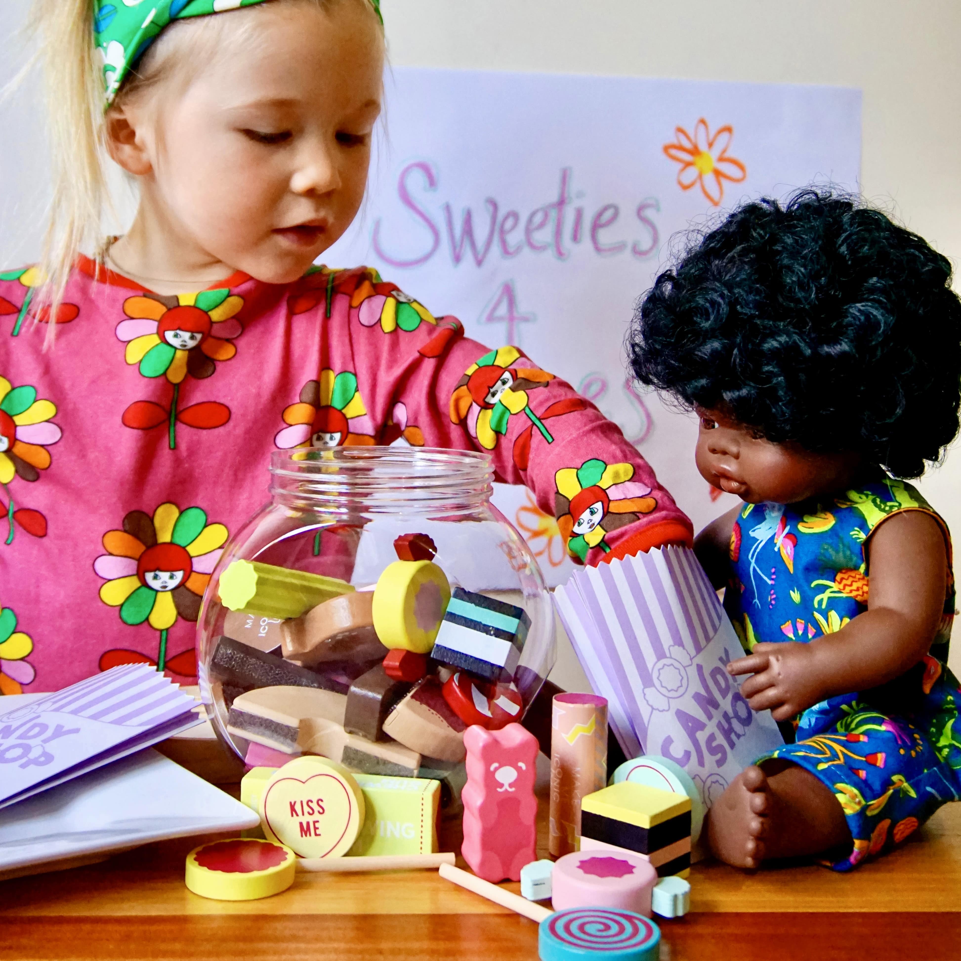 Wooden candy jar toy set for kids featuring hand-painted lollies, candy canes and wrapped sweets in an acrylic jar designed for imaginative pretend play.