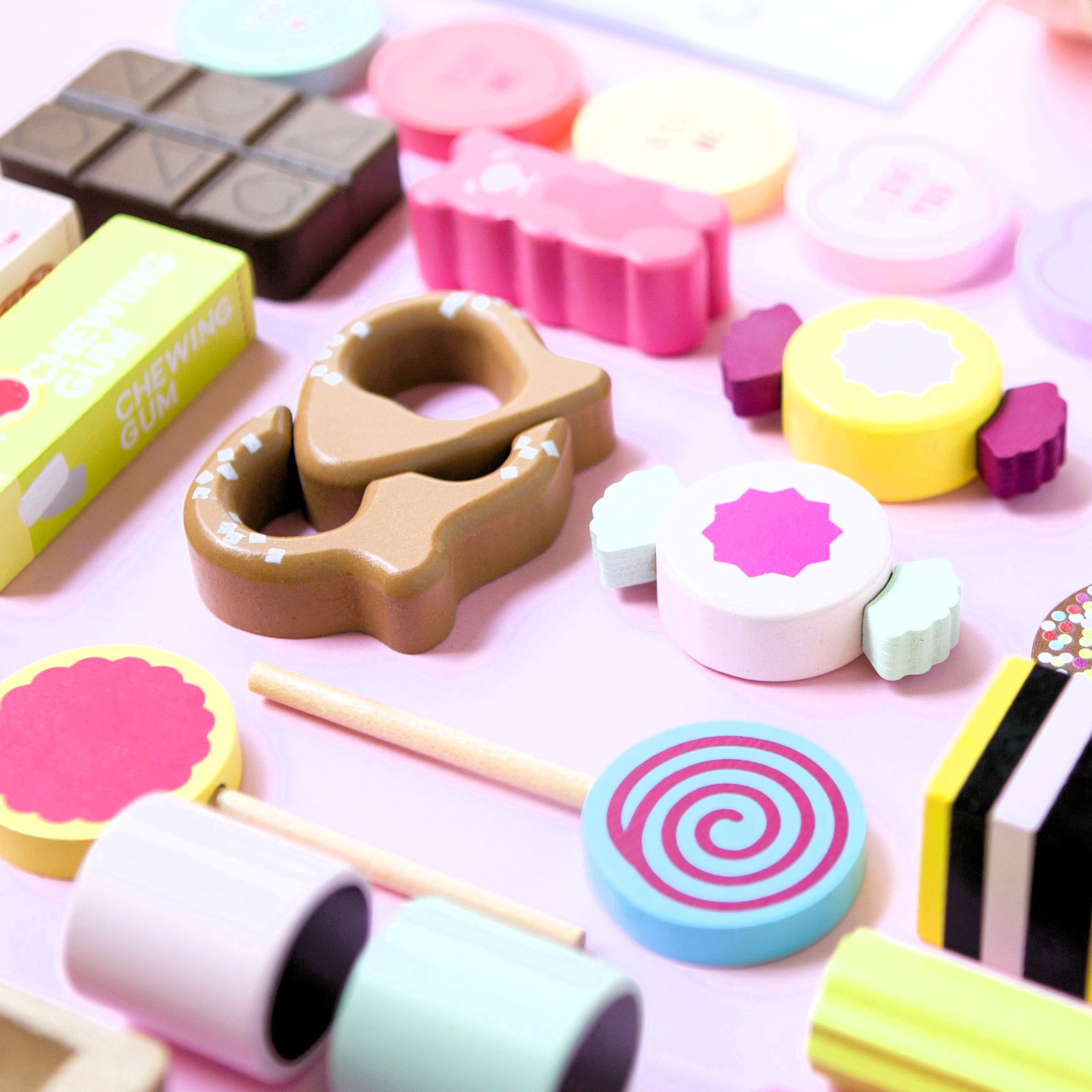 Wooden candy jar toy set for kids featuring hand-painted lollies, candy canes and wrapped sweets in an acrylic jar designed for imaginative pretend play.