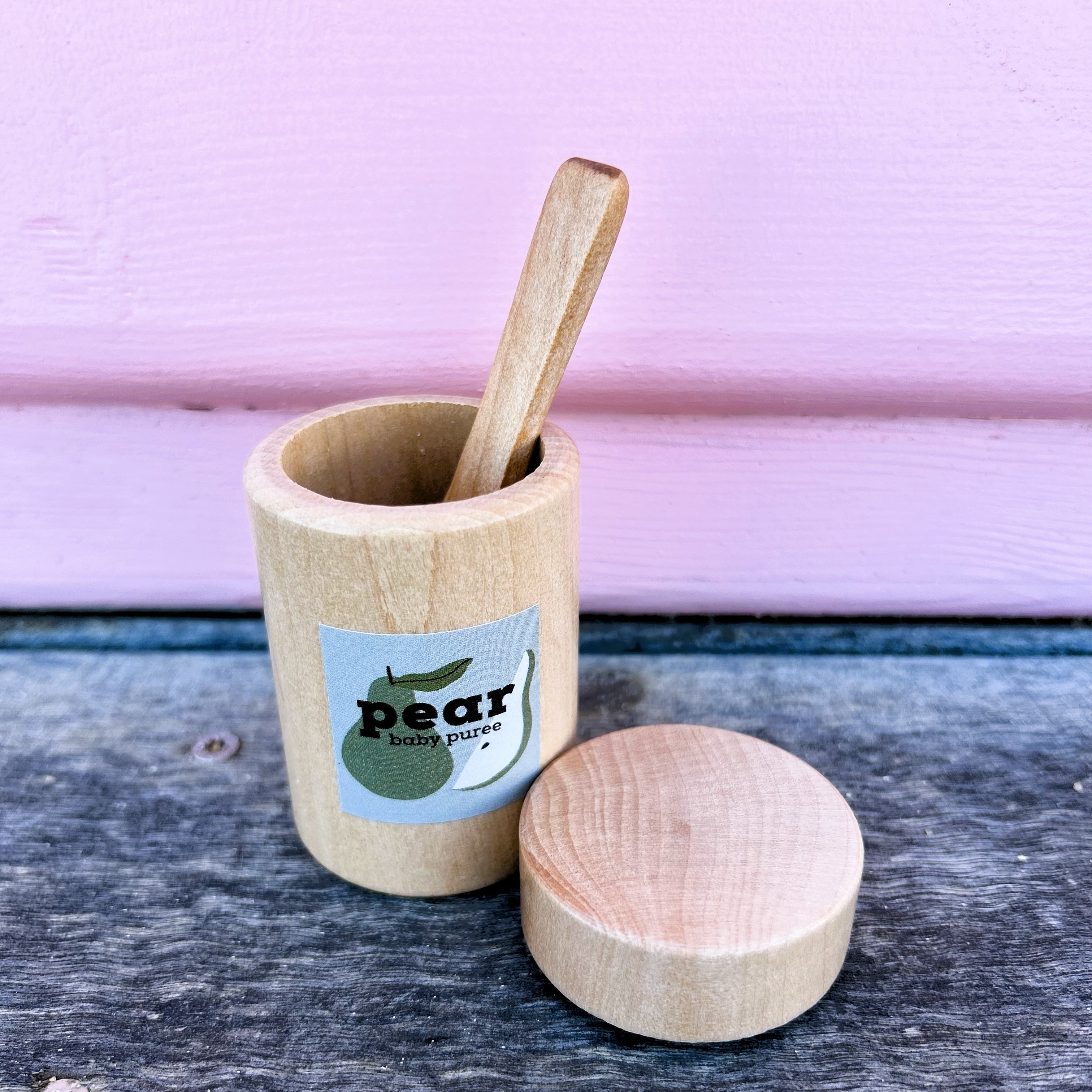 Make Me Iconic 3-piece wooden toy jar set with jar, removable lid, and wooden spoon is perfect for pretend play, scooping fun, and imaginative role play.