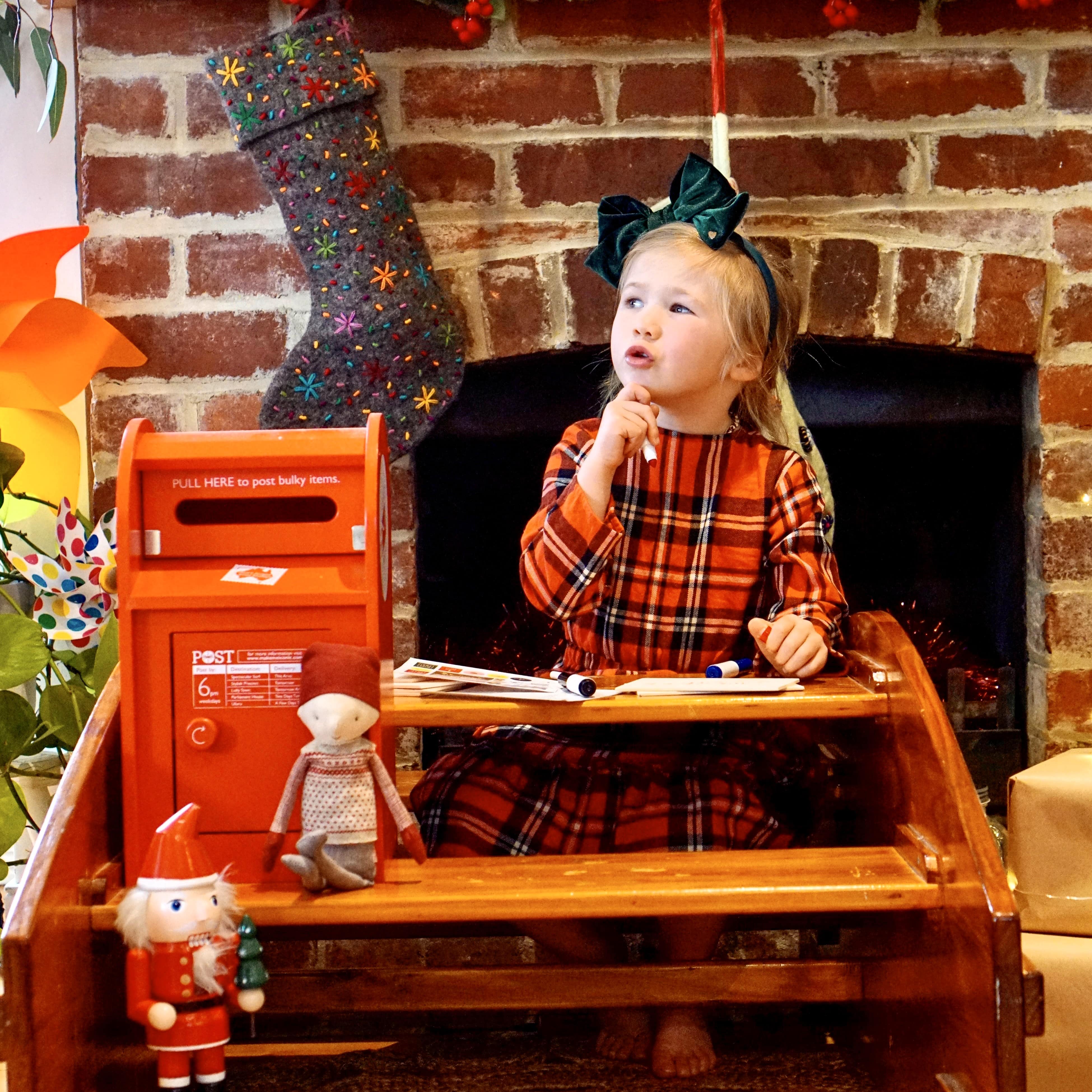 Wooden Australian post box toy with working mail slot, 6 wooden letters, and 6 Velcro stamps perfect for imaginative pretend play and storytelling.