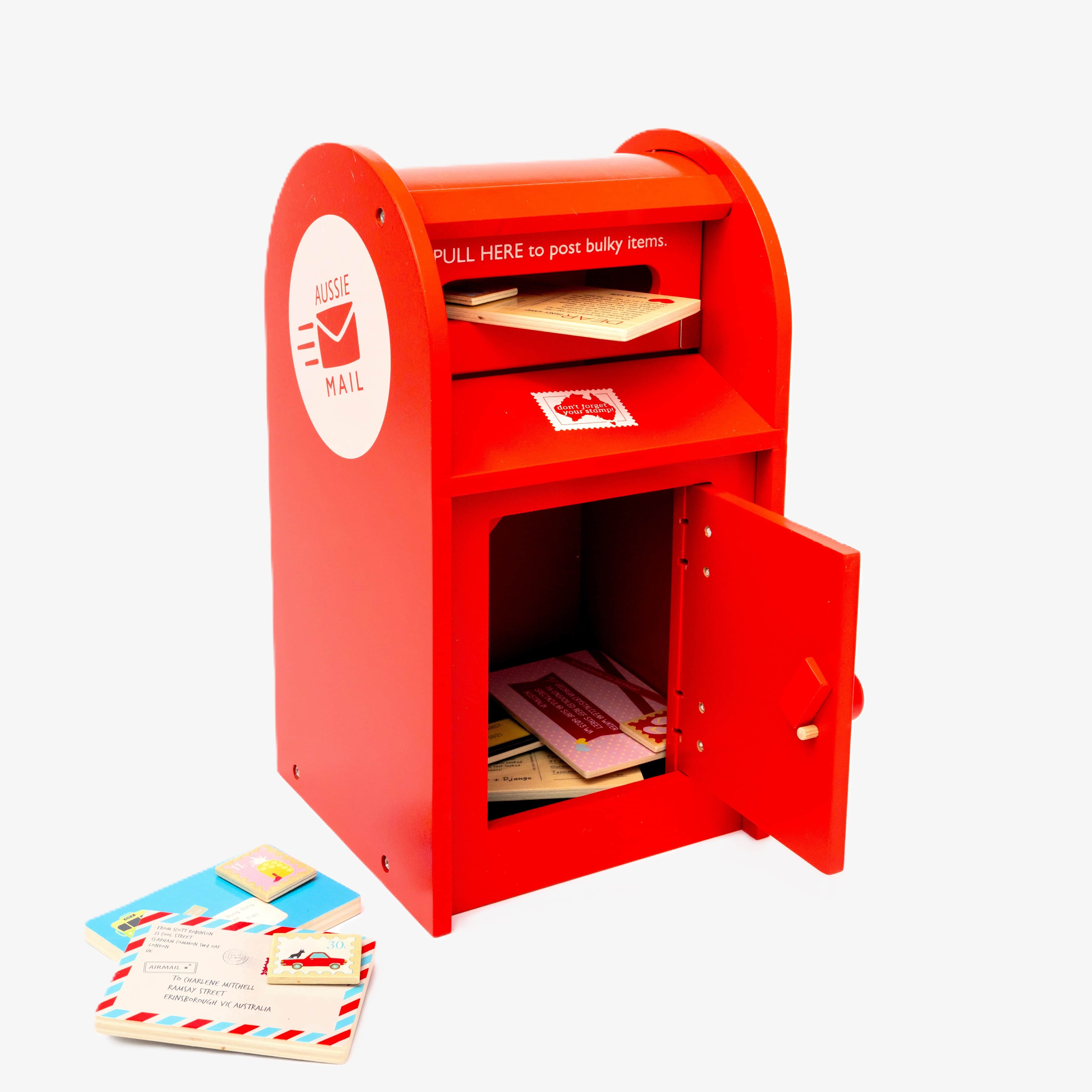 Wooden Australian post box toy with working mail slot, 6 wooden letters, and 6 Velcro stamps perfect for imaginative pretend play and storytelling.