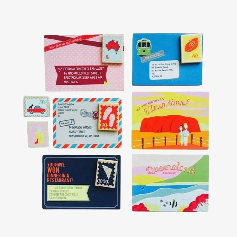 Wooden Australian post box toy with working mail slot, 6 wooden letters, and 6 Velcro stamps perfect for imaginative pretend play and storytelling.
