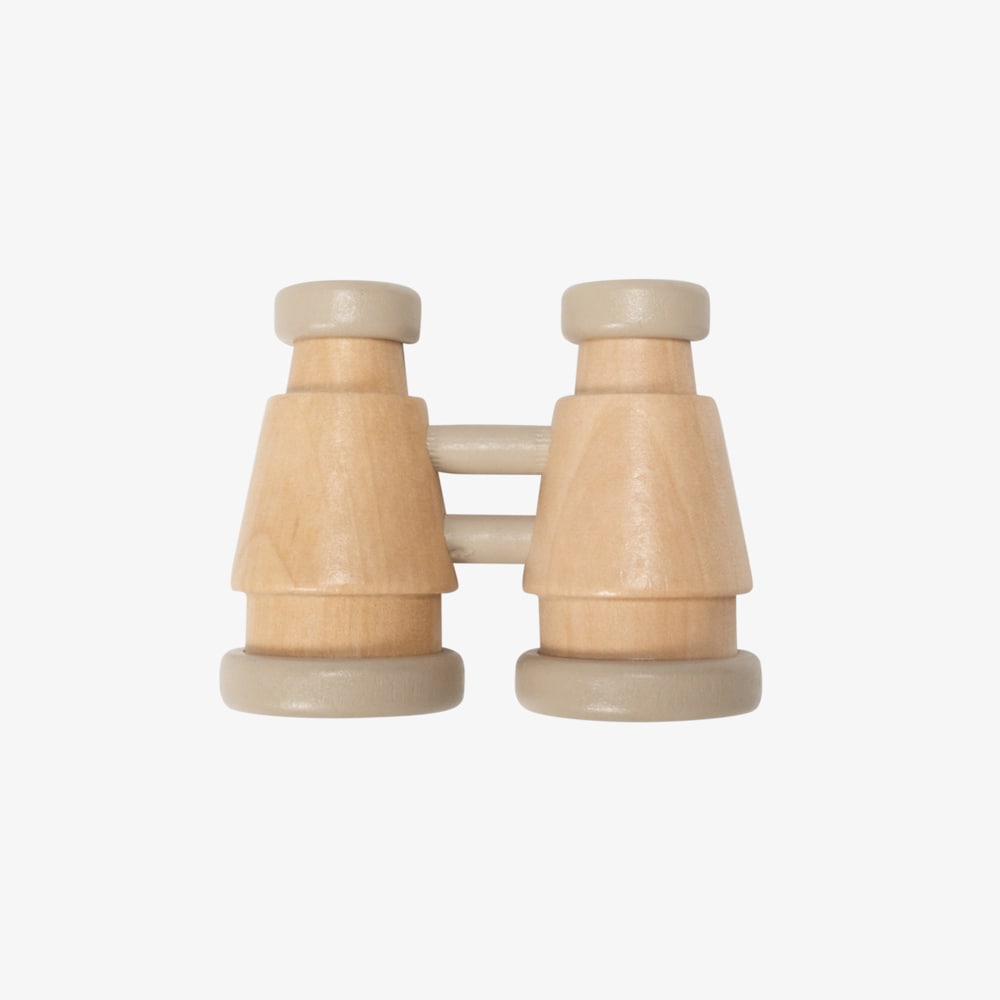 Make Me Iconic wooden toy binoculars with a smooth natural finish, perfectly sized for little hands. Ideal for pretend play adventures like pirate hunts, backyard exploration, or spy missions, encouraging creativity and role-play without screens or batteries.