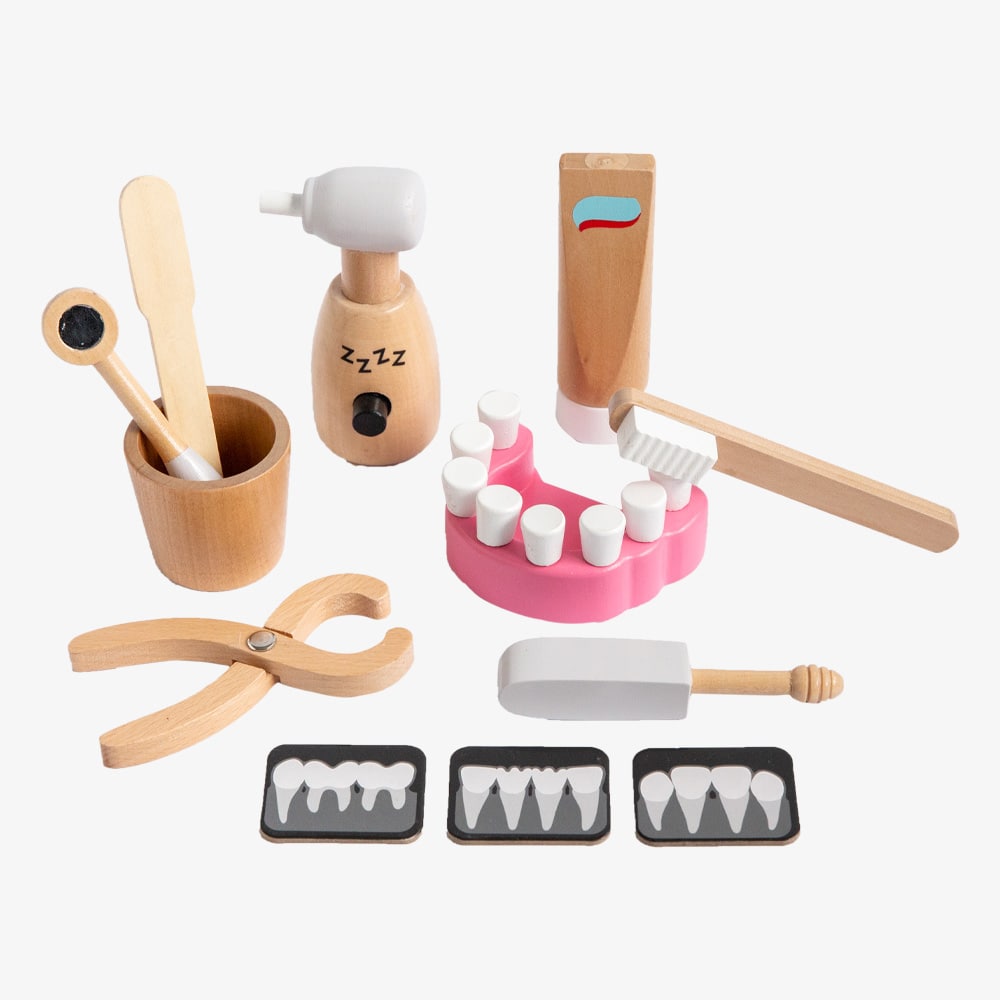 Wooden toy dentist kit with model mouth, removable teeth, dental tools, and carry box for imaginative pretend play
