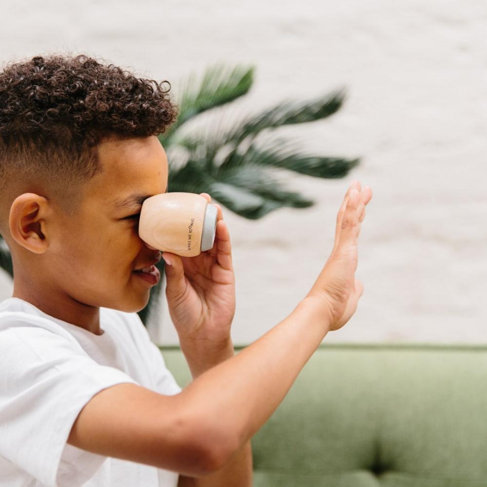 Make Me Iconic wooden kaleidoscope toy made from natural timber, designed for STEM learning, imaginative play, and visual discovery through light and reflection.
