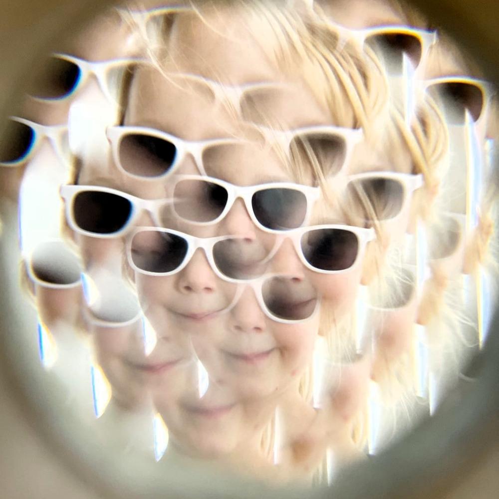 Make Me Iconic wooden kaleidoscope toy made from natural timber, designed for STEM learning, imaginative play, and visual discovery through light and reflection.