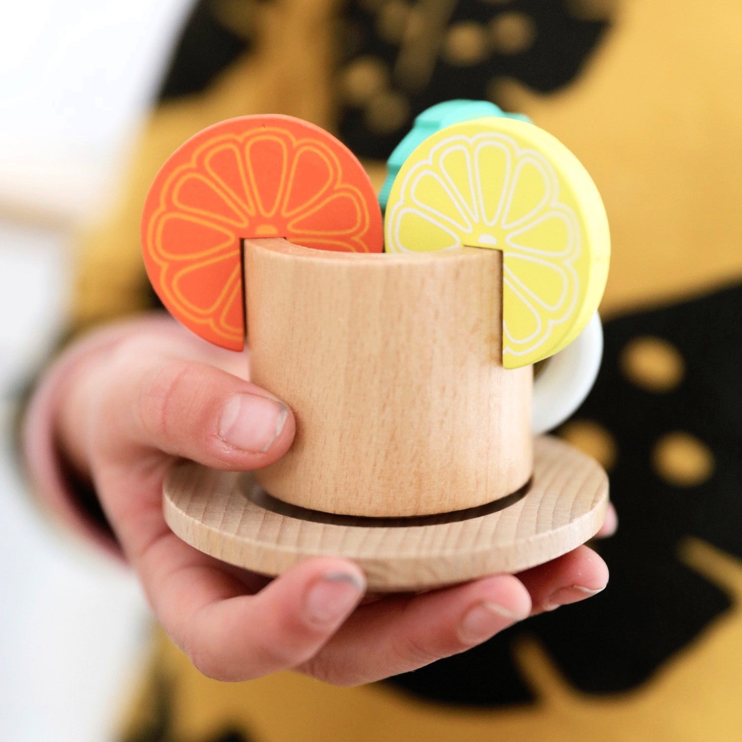 Make Me Iconic 27-piece wooden toy Tea Set Extension Set with tea cups, tea bags, tongs, cookies, and accessories. Ideal for pretend play and perfectly matched with our wooden toy Tea Set.