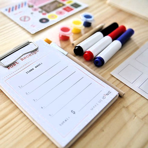 DIY Post Box Letters Craft Kit with colourful paper letters, stamps, and envelopes designed to pair with wooden toy Iconic Post Box for imaginative play.