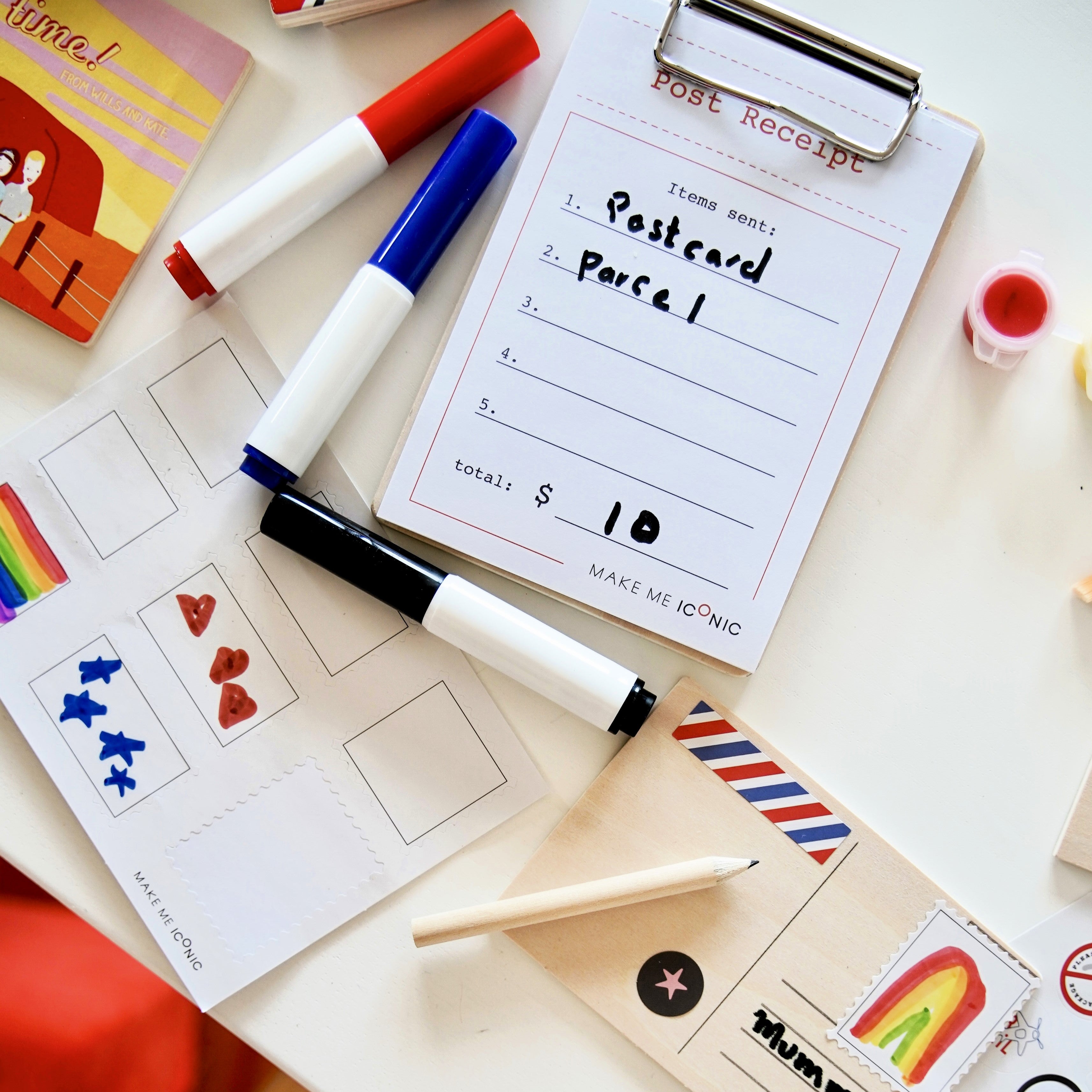 DIY Post Box Letters Craft Kit with colourful paper letters, stamps, and envelopes designed to pair with wooden toy Iconic Post Box for imaginative play.