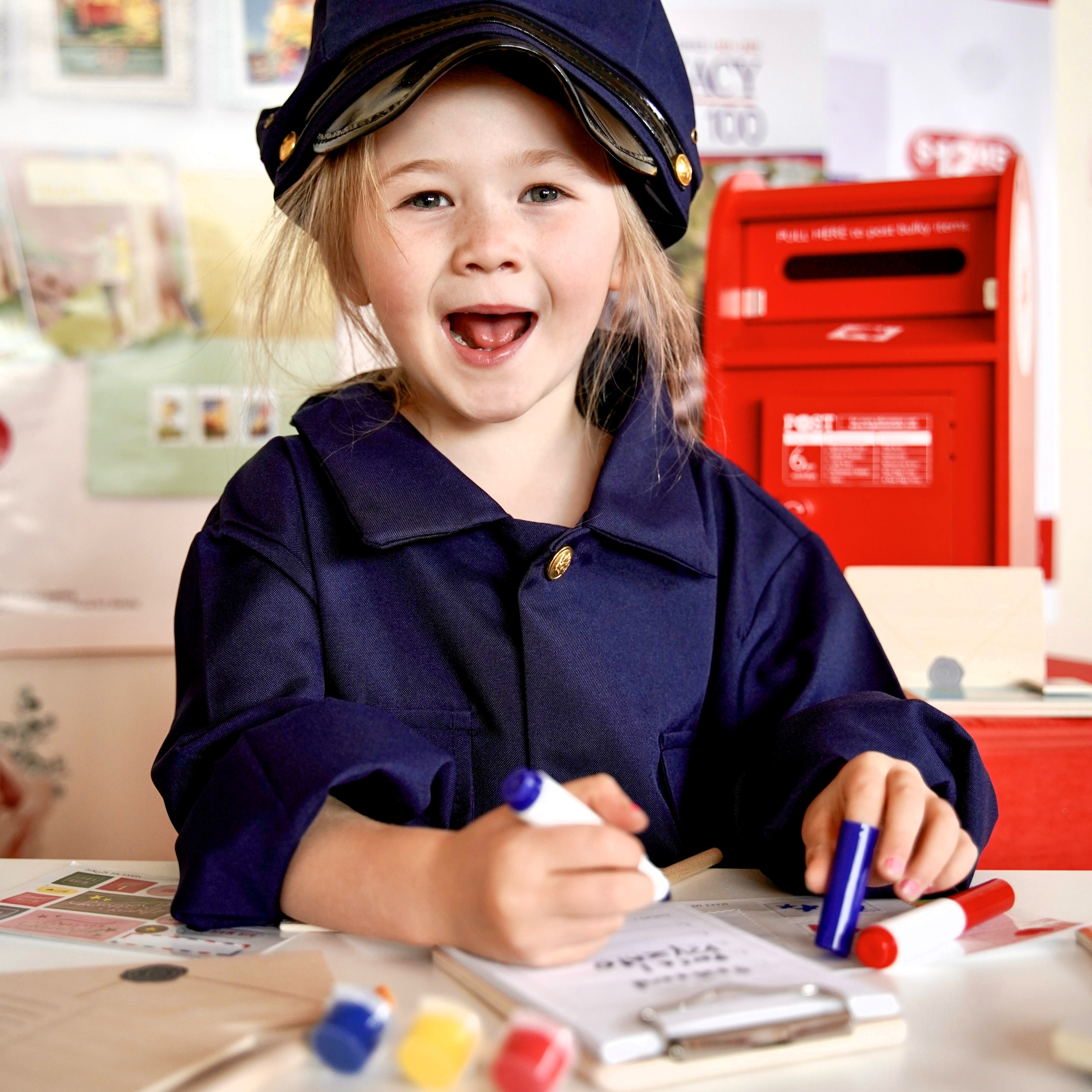 DIY Post Box Letters Craft Kit with colourful paper letters, stamps, and envelopes designed to pair with wooden toy Iconic Post Box for imaginative play.