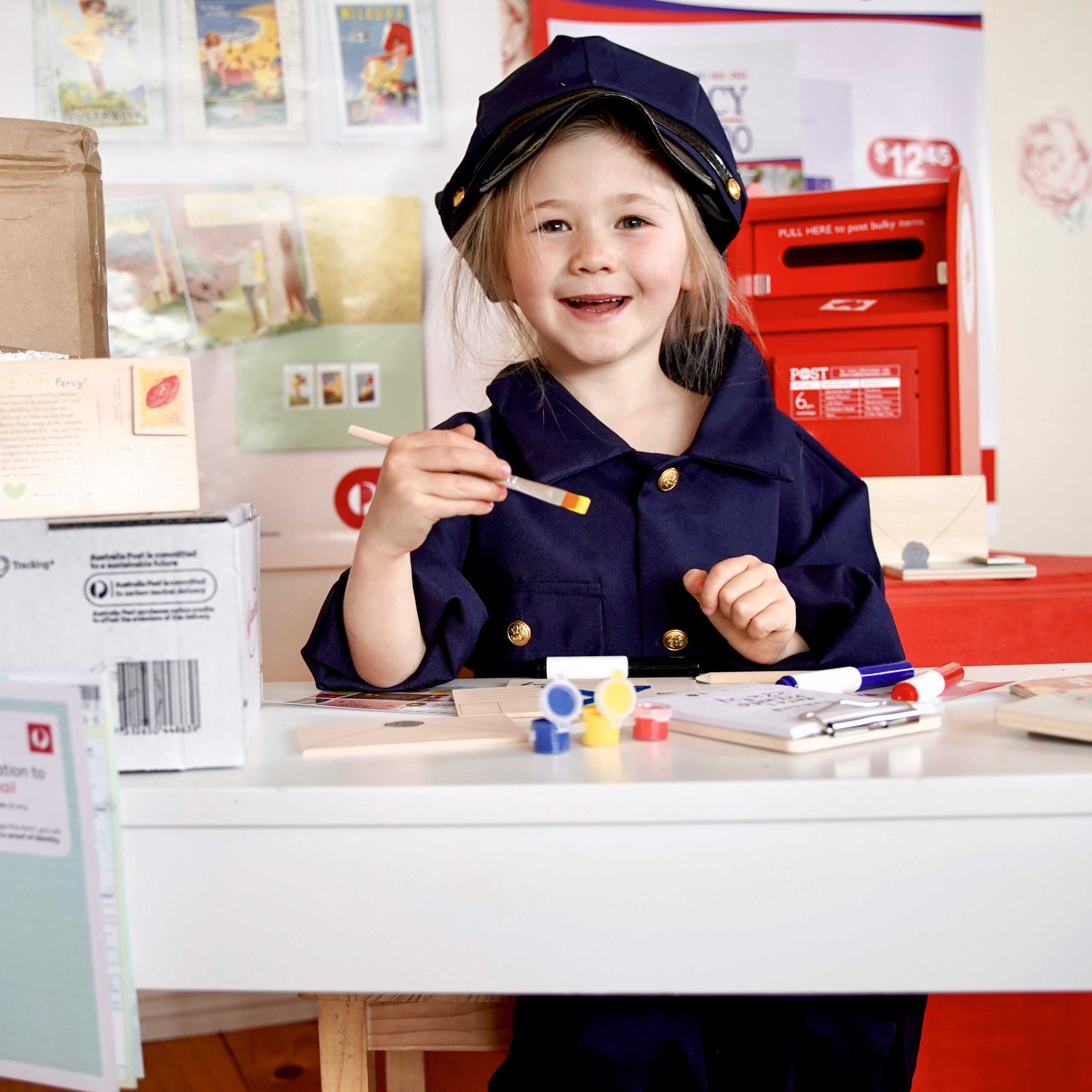 DIY Post Box Letters Craft Kit with colourful paper letters, stamps, and envelopes designed to pair with wooden toy Iconic Post Box for imaginative play.