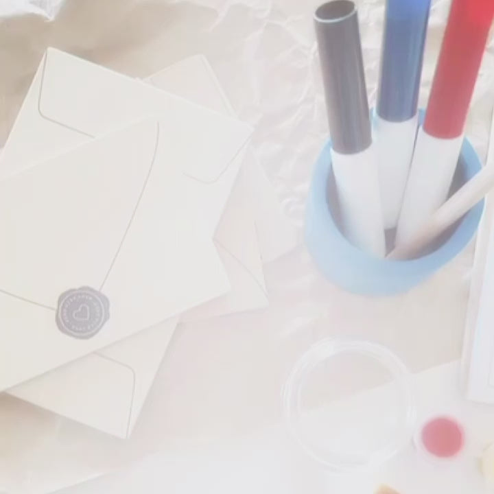 DIY Post Box Letters Craft Kit with colourful paper letters, stamps, and envelopes designed to pair with wooden toy Iconic Post Box for imaginative play.