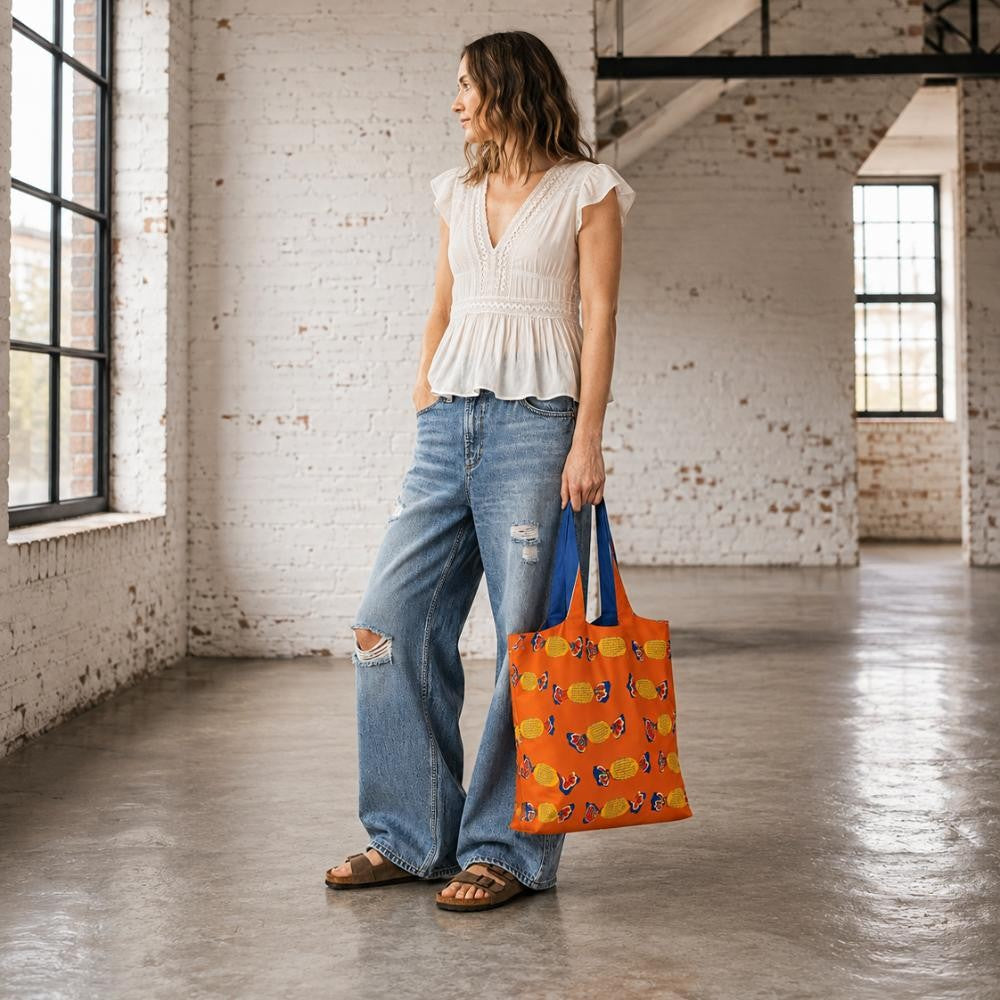 Foldable reusable shopping bags featuring colourful Australian and Melbourne-inspired designs by Make Me Iconic.