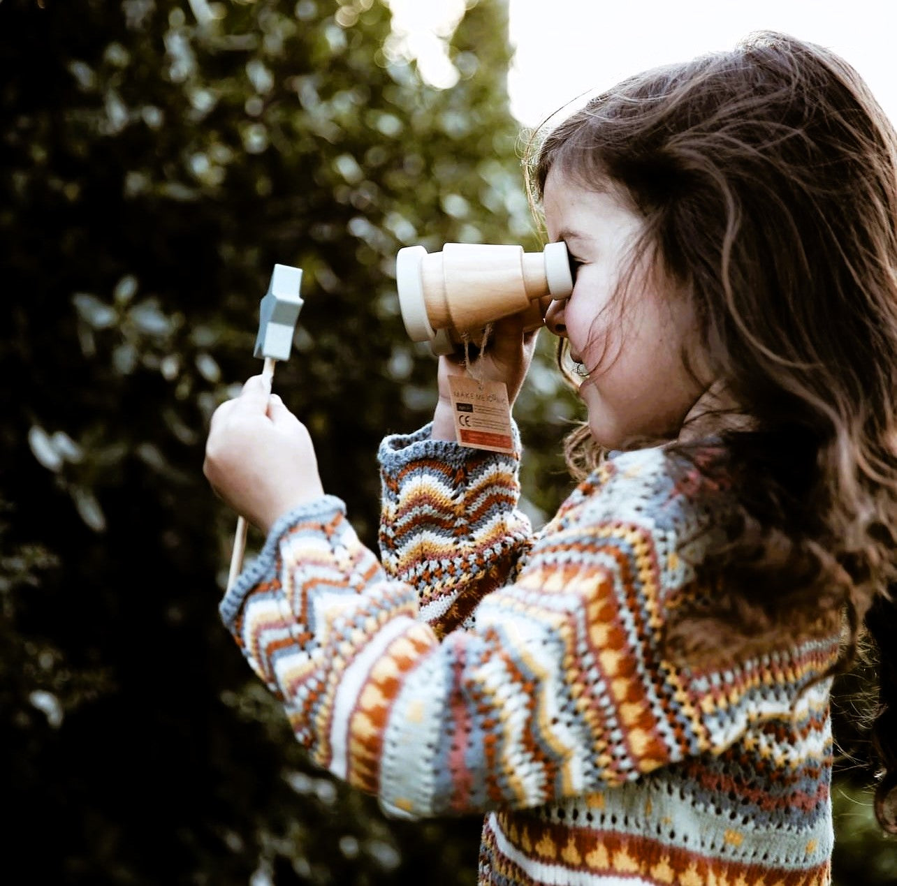 Children playing with affordable wooden toys and pretend play sets from our Loose Change series of wooden toys