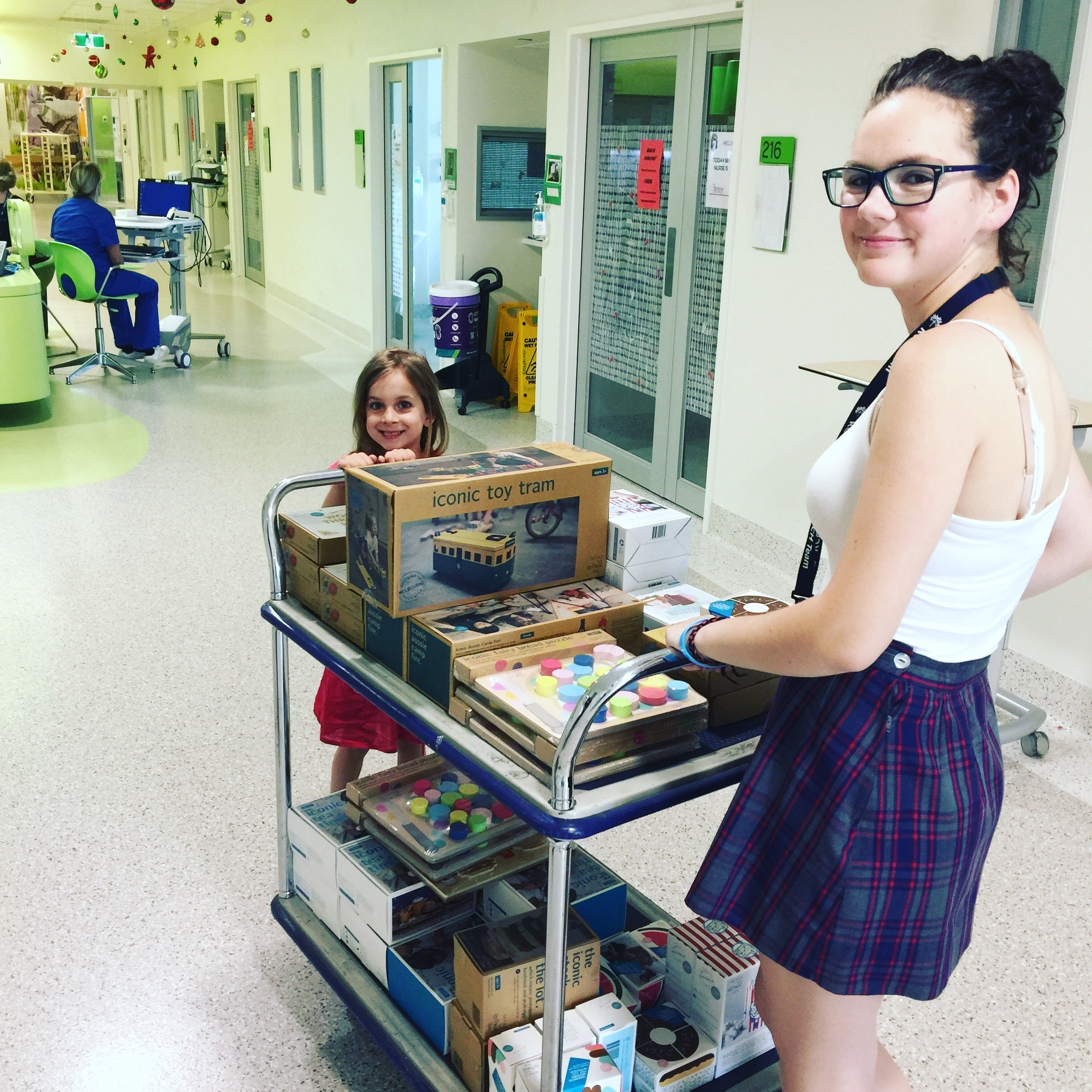 Make Me Iconic donating brand-new wooden toys to children in the Royal Children’s Hospital Oncology Unit to support screen-free, comforting play during treatment.