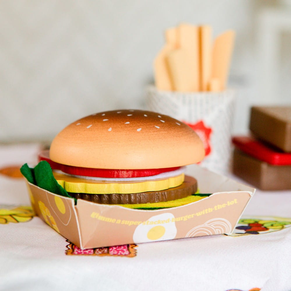 Wooden Iconic Aussie Food Set for kids featuring lamington, pavlova, burger with the lot, sausage sizzle and pretend play food pieces
