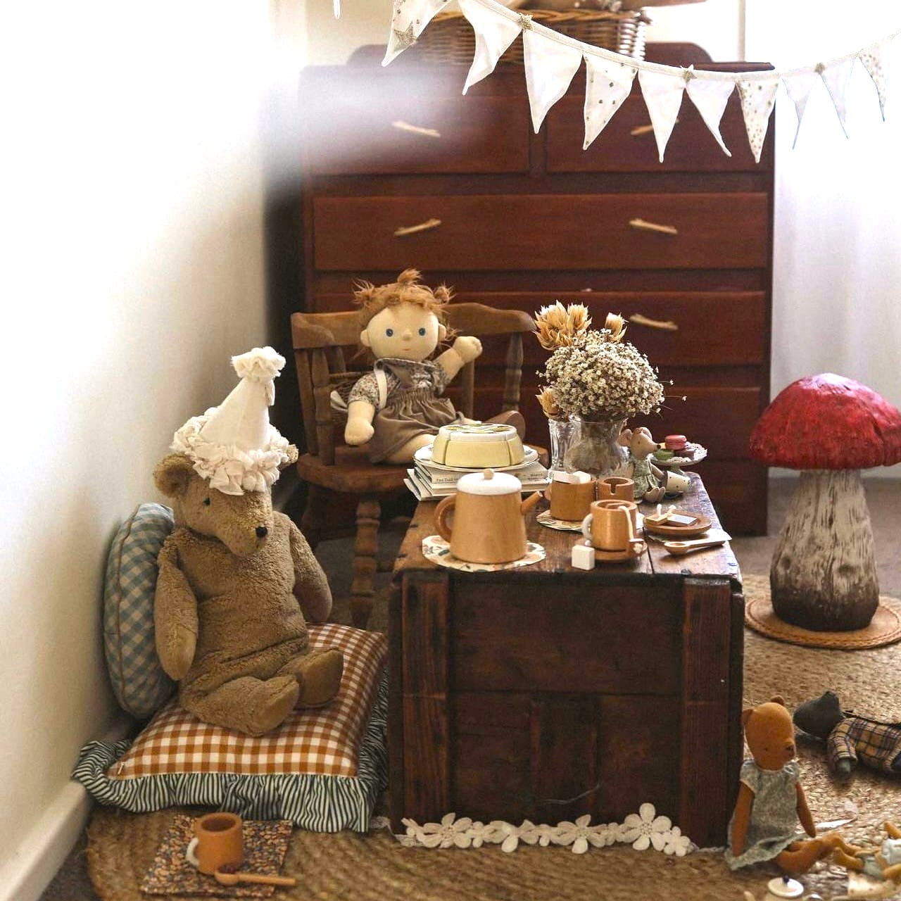 Wooden tea set for kids styled for a pretend tea party with teddy bears and dolls, encouraging open-ended imaginative play at home