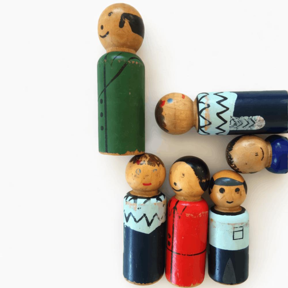 Well-loved worn-in wooden toys showing natural play wear, demonstrating the durability and long-lasting quality of Make Me Iconic wooden toys.