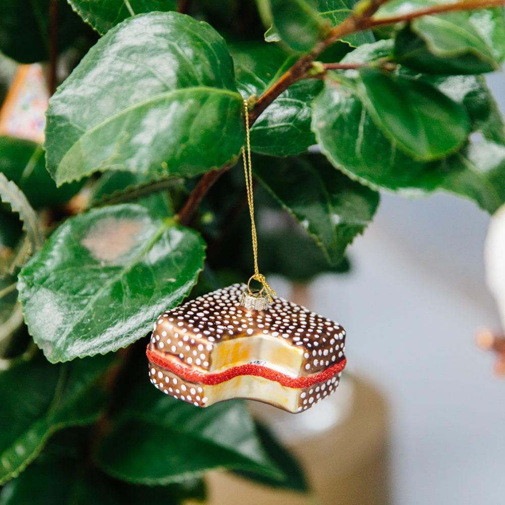 Make Me Iconic Christmas glass ornament set, 5-piece Australian-themed decorations featuring Fairy Bread, Lamington, Ute with tree, Surfboard, and Cockatoo, crafted in glass with paint and glitter details, great for gifts and Aussie souvenirs.