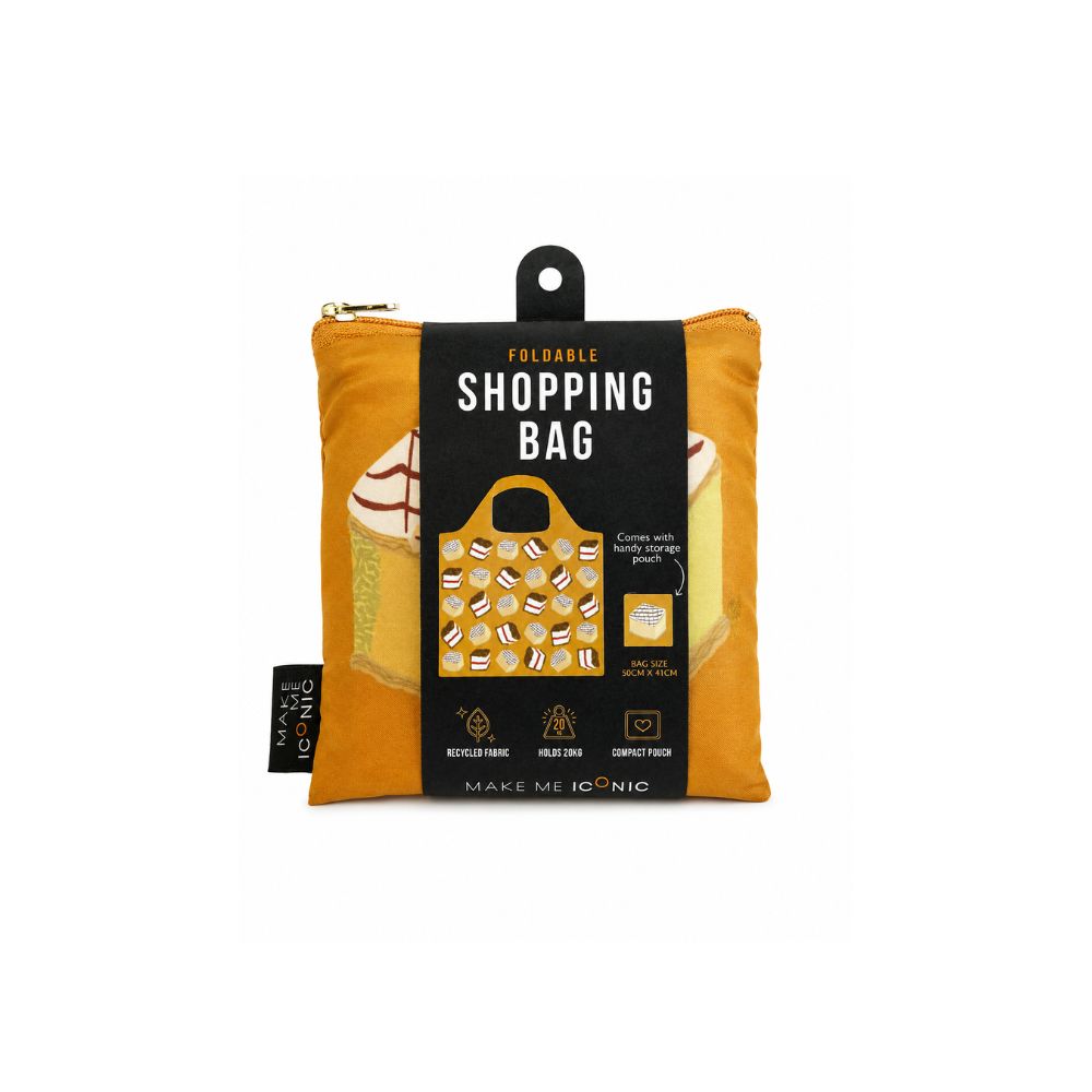 A Make Me Iconic reusable foldable shopping bag featuring a nostalgic Australian lamington design on a playful background. Made from 100% recycled fabric, this lightweight bag folds into its own matching pouch, making it perfect for shopping, travel, or everyday use while celebrating one of Australia’s most iconic sweet treats.