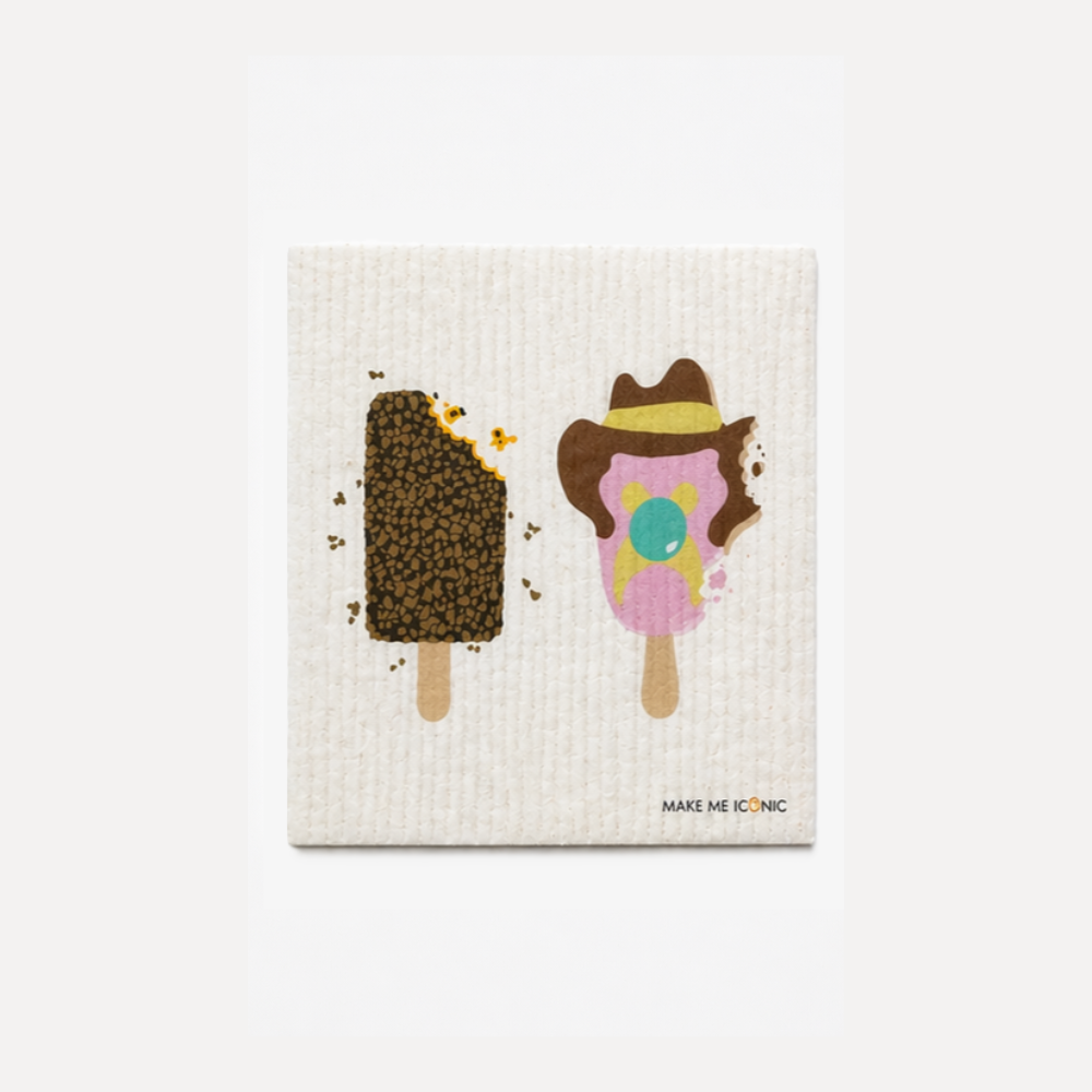 A Make Me Iconic reusable Swedish dishcloth featuring illustrations of three iconic Australian frozen treats: Bubble O' Bill, Golden Gaytime and Sunnyboy. The eco-friendly sponge has a nostalgic Aussie ice cream design in bright colours, making it a fun and practical kitchen cleaning cloth for everyday use.