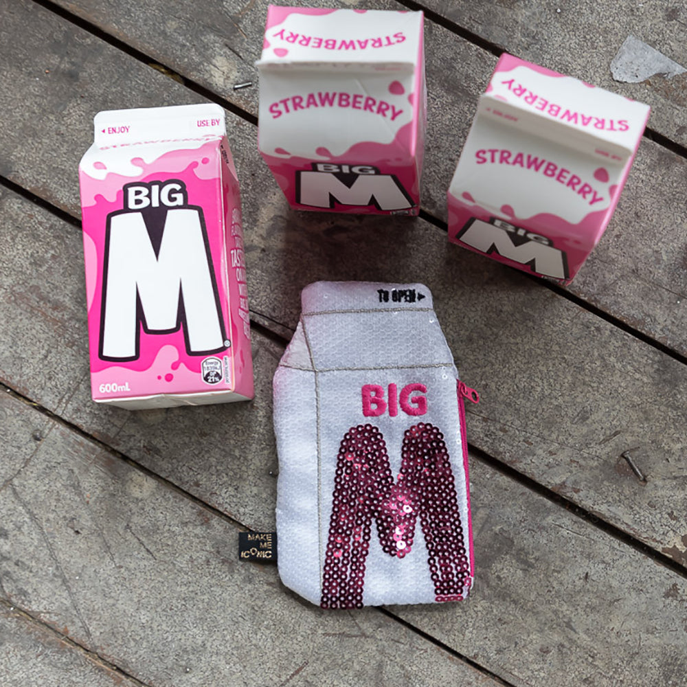 Big M Pocket Purse inspired by the iconic Aussie strawberry milk drink. Featuring shimmering sequins, it's perfect for coins, keys and little treasures.