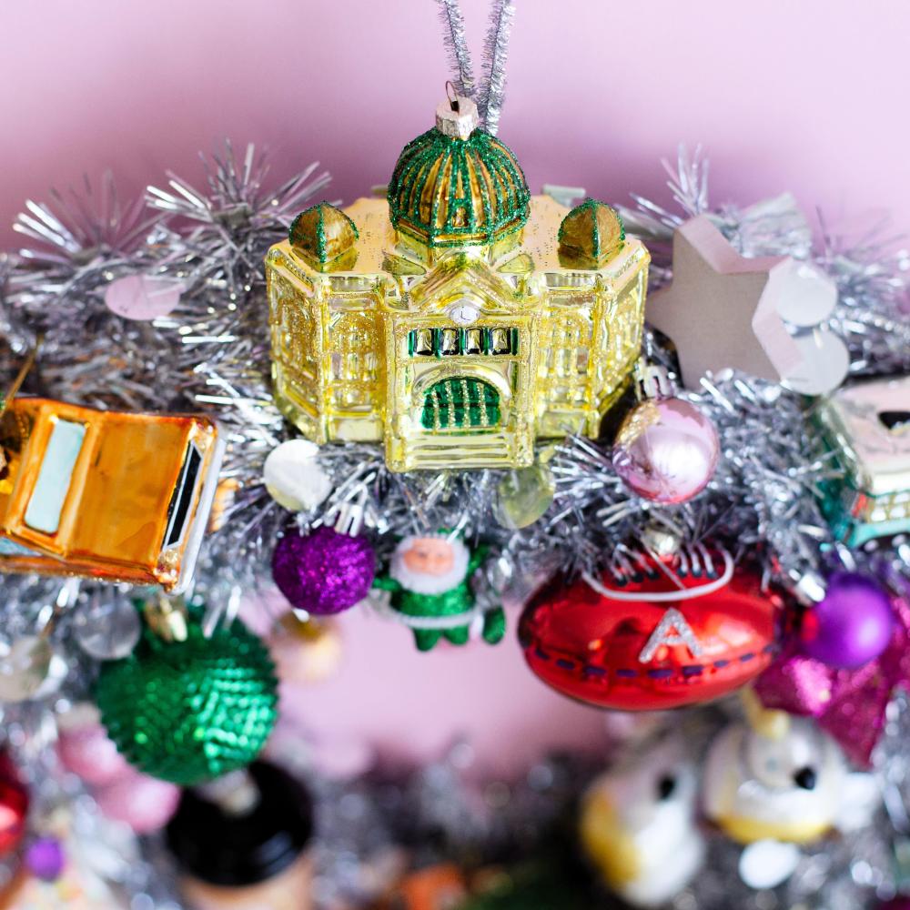Melbourne Christmas glass ornaments in a gift box featuring Australian holiday decorations such as the Skipping Girl, W-Class Tram, Flinders Street Station, and Coffee Snob designs.