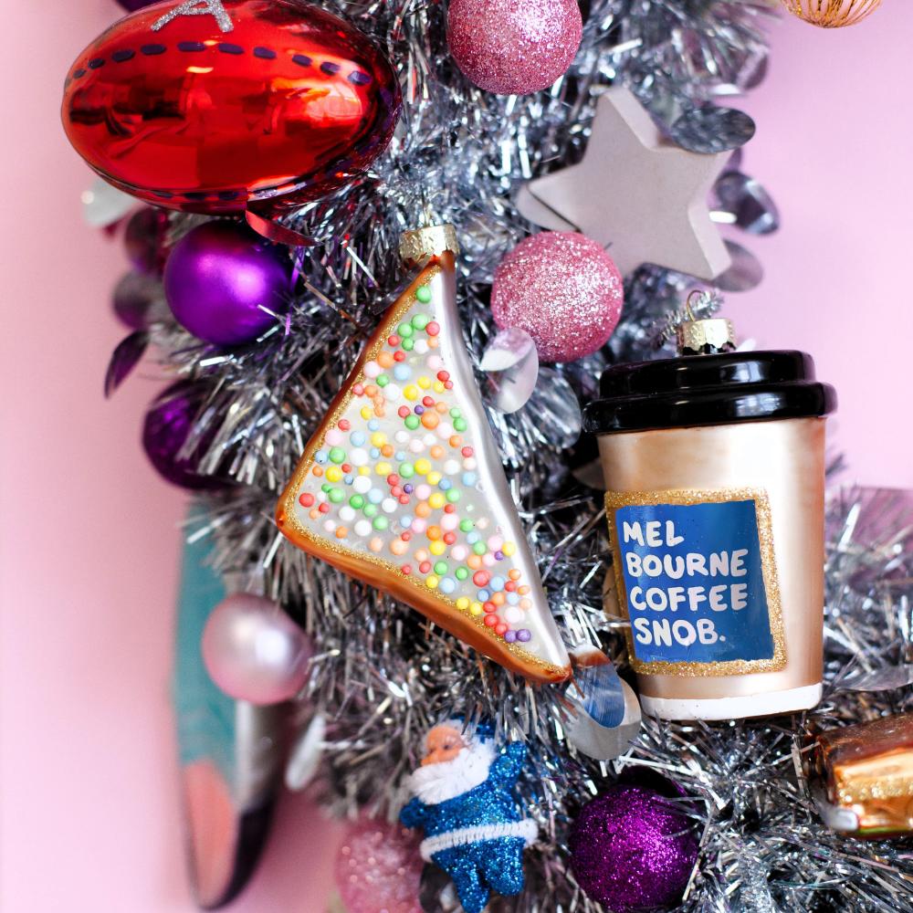 Melbourne Christmas glass ornaments in a gift box featuring Australian holiday decorations such as the Skipping Girl, W-Class Tram, Flinders Street Station, and Coffee Snob designs.