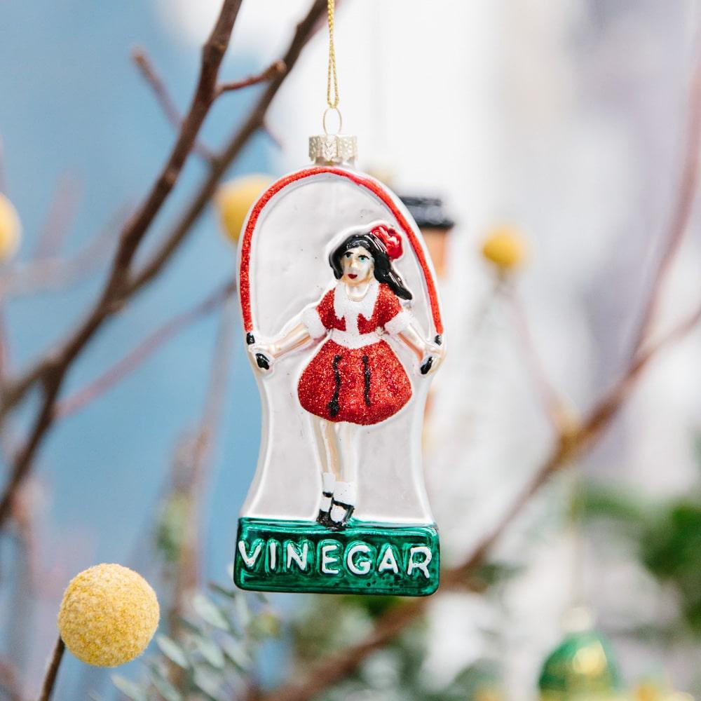 Melbourne Christmas glass ornaments in a gift box featuring Australian holiday decorations such as the Skipping Girl, W-Class Tram, Flinders Street Station, and Coffee Snob designs.