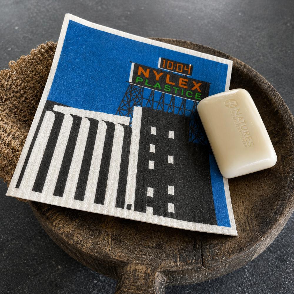 Inspired by Melbourne’s iconic Skipping Girl and Nylex Plastics signs, this Swedish dish cloth celebrates two beloved landmarks that have lit up the city skyline for generations. Made from natural fibres, it’s durable, reusable, super absorbent, and designed to bring a nostalgic touch of everyday Melbourne life into your kitchen while making cleaning a little more fun.