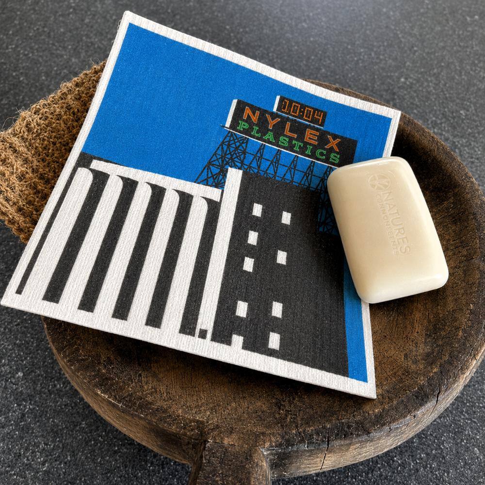 Inspired by Melbourne’s iconic Skipping Girl and Nylex Plastics signs, this Swedish dish cloth celebrates two beloved landmarks that have lit up the city skyline for generations. Made from natural fibres, it’s durable, reusable, super absorbent, and designed to bring a nostalgic touch of everyday Melbourne life into your kitchen while making cleaning a little more fun.