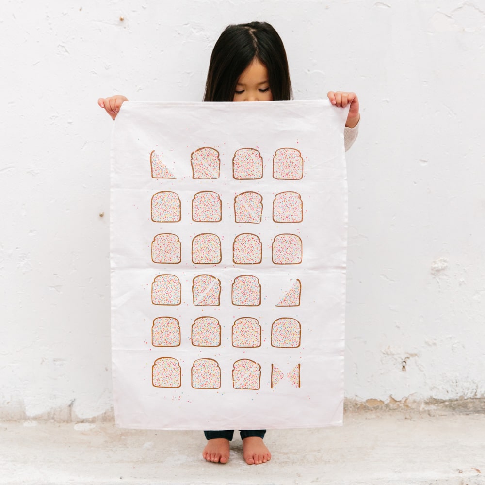 Make Me Iconic Fairy Bread Tea Towel celebrating Australian childhood nostalgia with a playful Aussie twist and rainbow sprinkles.