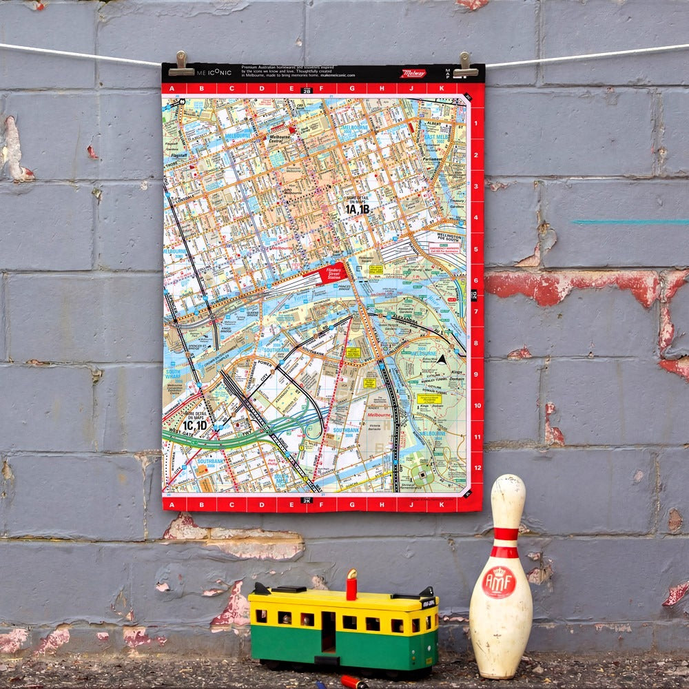 Iconic Melway Tea Towel featuring a vintage-style Melbourne street directory map design inspired by the classic Melway, celebrating Melbourne's roads, landmarks and the nostalgia of navigating before GPS. A unique tribute to an iconic part of Melbourne culture.