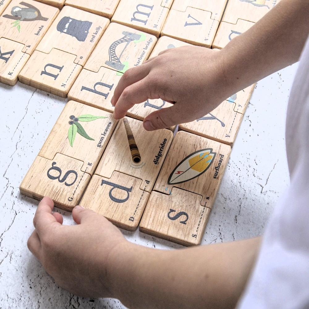 Australian Alphabet wooden jigsaw puzzle for kids with iconic Aussie animals, foods and landmarks – educational wooden toy and Australian gift by Make Me Iconic.