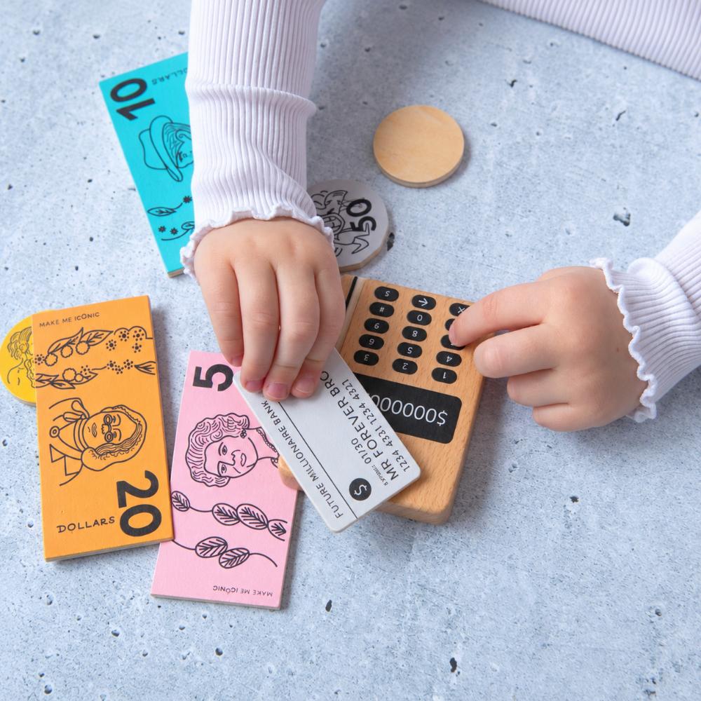 Make Me Iconic Iconic Australian Money & Point of Sale Machine wooden toy set for kids, with POS machine, credit card, Aussie banknotes and coins for imaginative shop role play and early maths learning.