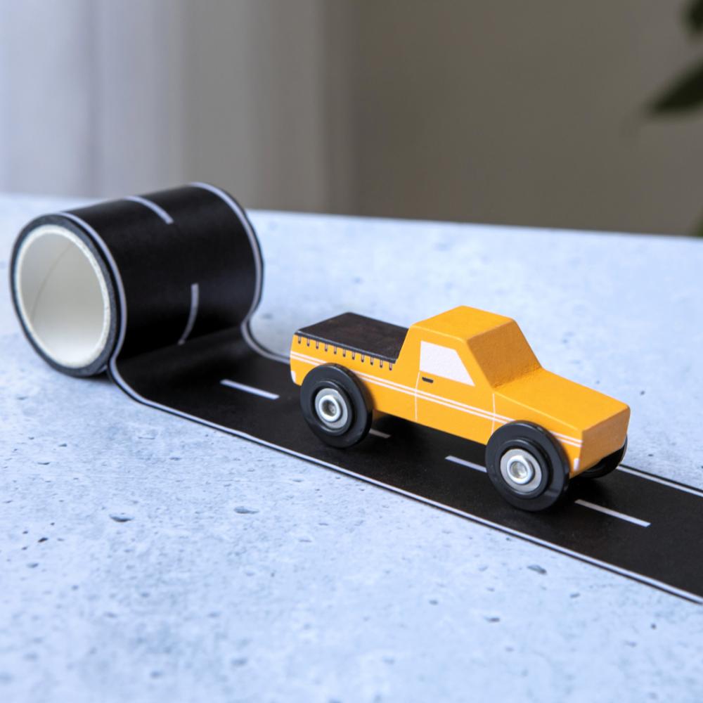 Make Me Iconic Iconic Ute & Road Tape Set with orange wooden Aussie ute, roll-out road tape and wooden Australian road signs.