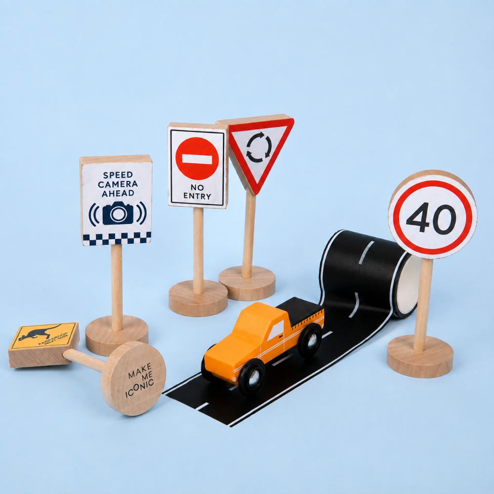 Make Me Iconic Iconic Ute & Road Tape Set with orange wooden Aussie ute, roll-out road tape and wooden Australian road signs.