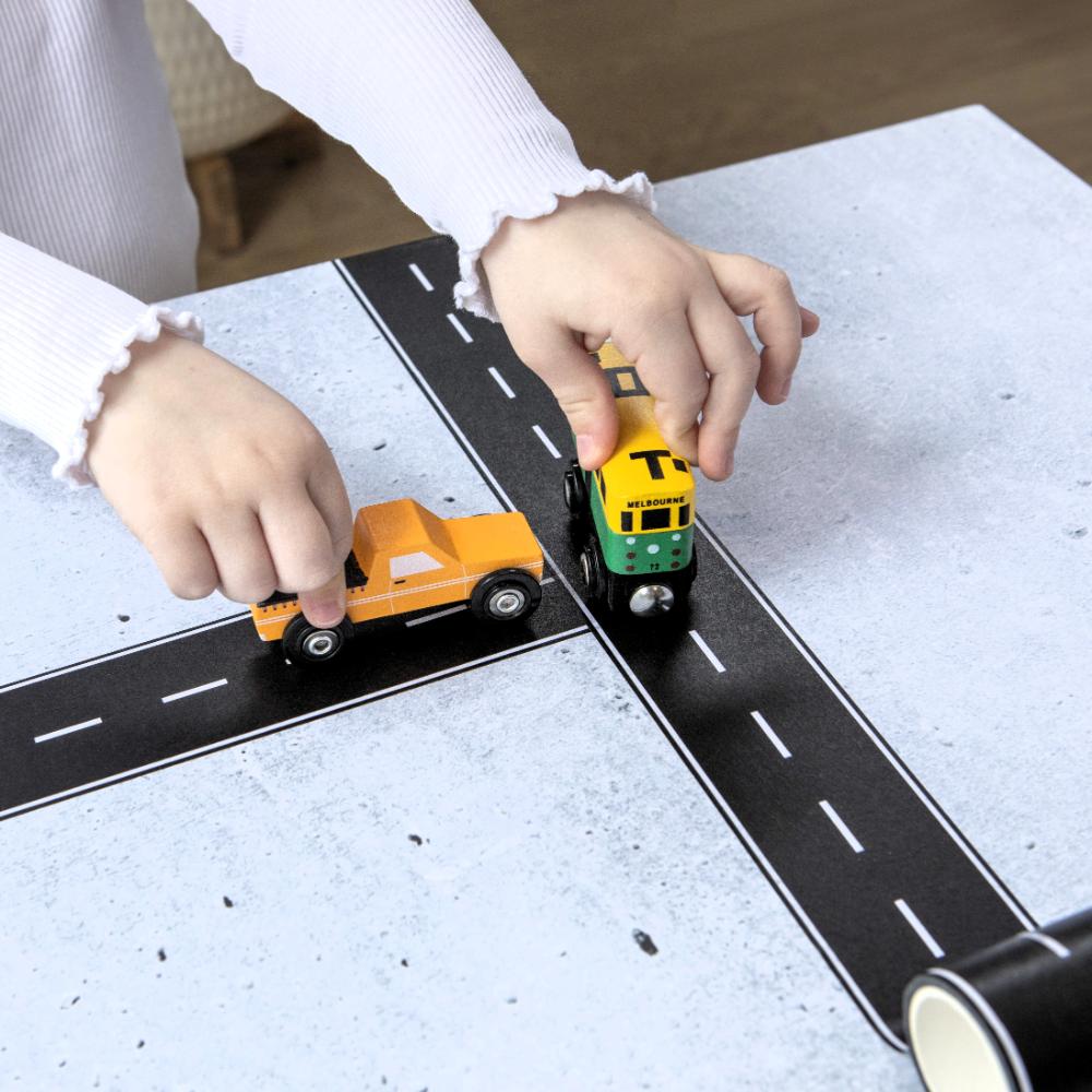 Make Me Iconic Iconic Ute & Road Tape Set with orange wooden Aussie ute, roll-out road tape and wooden Australian road signs.