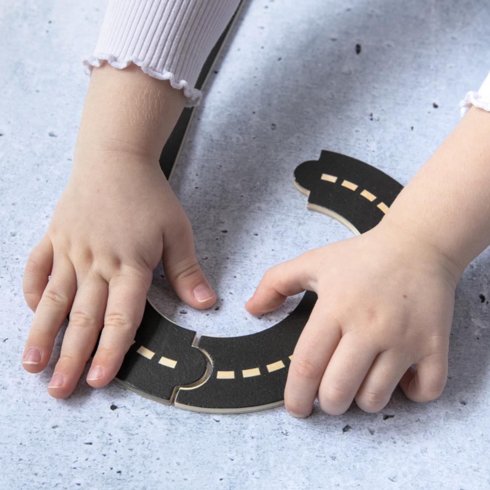 Make Me Iconic Iconic Roads wooden toy road set for kids with reusable straight and curved road pieces for imaginative vehicle play, screen-free play and creating mini Australian streets and towns.